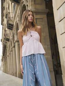 Nöista Áo hai dây màu hồng nhạt kẻ sọc với phần ngực nhún bèo và đính hạt ở phía trước tạo dáng tôn lên vóc dáng. Dây áo mảnh có thể điều chỉnh và vạt áo xòe. Thích hợp cho mùa xuân, hè, đi nghỉ mát, hoặc mặc hàng ngày. Phong cách nghỉ dưỡng. - Màu Hồng baby - Xem 5