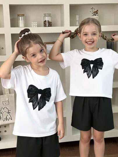 2pcs/Set Young Girls' Casual Minimalist Black Butterfly Print Short Sleeve Round Neck T-Shirt And Loose Wide Leg Shorts, Cute Cartoon Pattern Fashion Suitable For Spring And Summer, Girls Casual Outfit, T-Shirt And Shorts Set For Young GirlChildren 4-Season Outfit