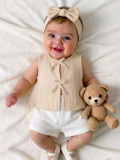 SHEIN Newborn Baby Girl Casual Cute Versatile Apricot Bow Sleeveless Tank Top Beige Baby Outfit Baby Summer Clothing Baby Vest Baby Top Baby Short Shirt Baby Girl Clothes Neutral Baby Outfits Newborn Baby Summer Clothes Baby Formal Outfit Baby Beige Outfits Neutral Baby Clothes Ootd For Baby Girl 0 To 12months Photoshoot Outfit For Baby Baby Summer Outfits Infant Summer Outfit Baby Girl Set Baby Photo Bamboo Baby Clothes