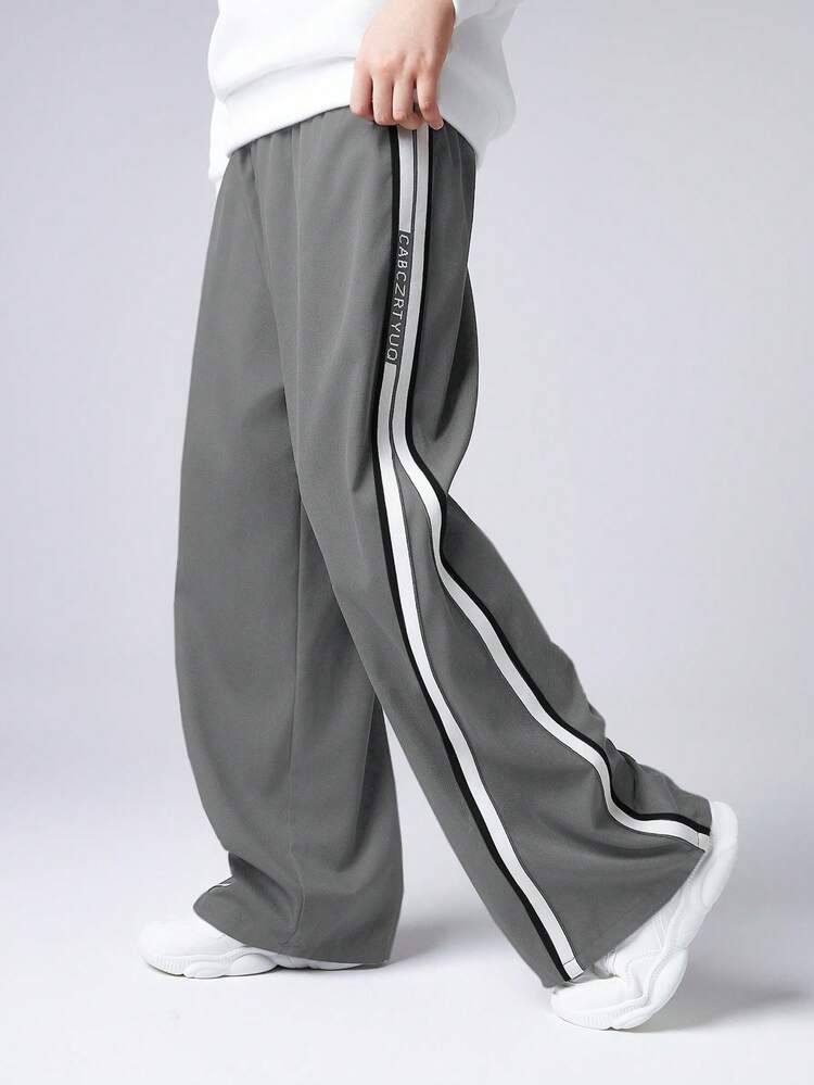 男童直筒侧边条纹宽松运动裤，适合秋冬季休闲、户外、上学穿着。 - 灰色 - 查看 5