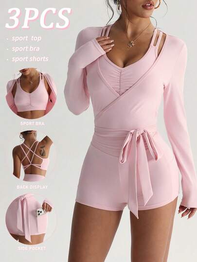 SHEIN Sovereign Charm 三件套女士春夏运动套装，包括：粉色马卡龙系带长袖V领运动上衣（后背交叉设计，带可拆卸胸垫）、性感运动文胸和常规腰围运动短裤。时尚百搭，适合日常休闲穿着、跑步、瑜伽、健身、网球、高尔夫、骑行等运动。