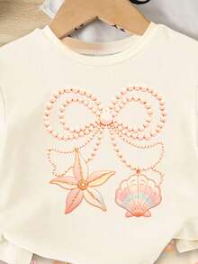 SHEIN 一套女婴珍珠蝴蝶结项链、印花可爱海洋生物贝壳蝴蝶结图案宽松圆领短袖T恤和修身骑行短裤套装，适合春夏、休闲、海滩、周末出行，可爱夏季女婴套装，韩版风格，夏季外出，女婴夏季服装，女婴贝壳套装，女婴沙滩套装 - 彩色 - 查看 4