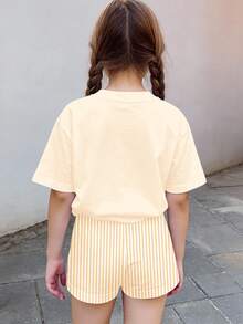 Bộ đồ đôi cho bé gái tuổi teen, màu kem và cam hoàng hôn, họa tiết hoa ly cổ điển và hoa nhiệt đới, gồm áo tay ngắn và quần short, thích hợp cho mùa hè. - Nhiều màu - Xem 2