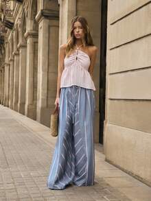 Nöista Áo hai dây màu hồng nhạt kẻ sọc với phần ngực nhún bèo và đính hạt ở phía trước tạo dáng tôn lên vóc dáng. Dây áo mảnh có thể điều chỉnh và vạt áo xòe. Thích hợp cho mùa xuân, hè, đi nghỉ mát, hoặc mặc hàng ngày. Phong cách nghỉ dưỡng. - Màu Hồng baby - Xem 6