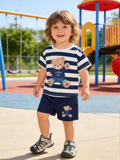 SHEIN 2pcs/Set Boys' Superhero Cartoon Pattern Loose Casual Short Sleeve Shorts Pajama Set, Summer