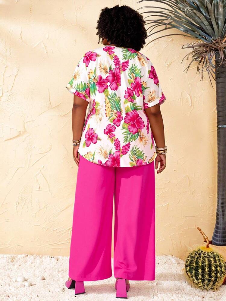 2pc Set Plus Size Women's Summer Casual Vacation  Floral Print V-Neck Short Sleeve Loose Shorter In Front And Longer In Back Blouse And Solid Color Pants 2 Piece Set With Pocket,Spring/Summer/ Vacation,Summer Holiday,Spring Break Outfits ,Vacation Outfits Women ,Holiday Outfits For Women,Going Out Outfits,2026 New Clothes,Simple And Fashionable For Everyday Wear,Suitable For Summer, Vacation, Commute, Daily Wear,Pink Set,Wide Leg Pants Set, Plus Size Pants Set, Plus Size Summer Sets, Plus Size Women Clothes 2 Piece, Plus Size 2 Piece Sets,Suitable For Summer, Vacation, Commute, Daily Wear, Summer Outfits