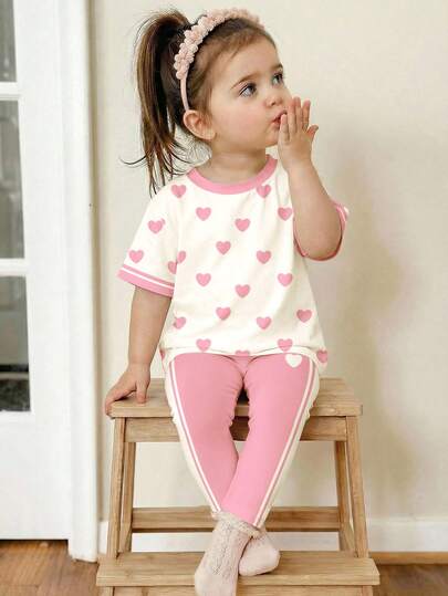 SHEIN 2pcs/Set Baby Girl Casual Heart Print Contrast Striped Round Neck Short Sleeve T-Shirt And Leggings Outfit, Suitable For Spring/Summer Daily Wear, Street Style, Outing, Vacation, Homecoming, Back To School