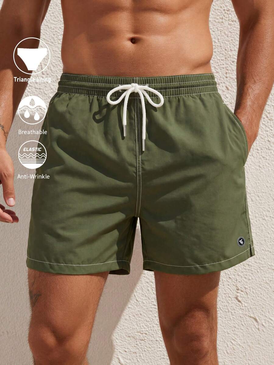 Manfinity Swimmode Quần short đi biển màu trơn thường ngày dành cho nam - xanh quân đội - Xem 1