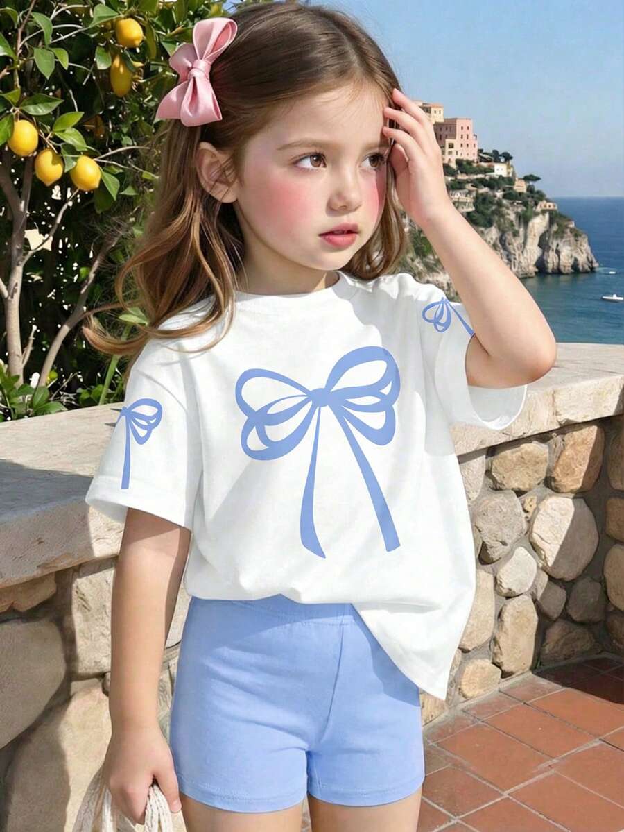 SHEIN Playful Pals 女婴蓝色蝴蝶结印花圆领短袖T恤和针织短裤两件套,可爱时尚,奶油粉色蝴蝶图案,休闲女婴套装,适合春夏、室内外穿着,也可作为校服。 - 彩色 - 查看 1