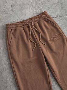 Manfinity Unisex 2 件套男士宽松落肩圆领短袖 T 恤和抽绳腰直筒裤套装夏季服装，舒适服装 - 咖啡棕 - 查看 4