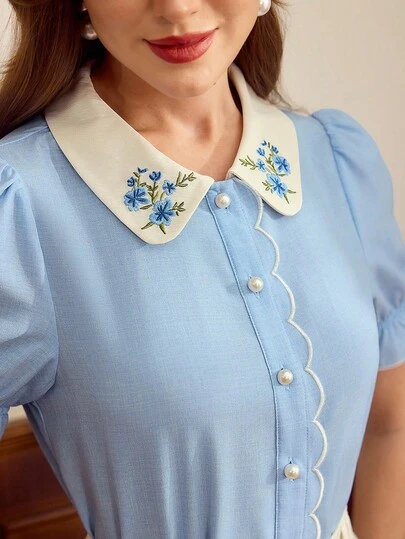 Vintamour Blusa elegante vintage para mujer con bordado floral, ribete de contraste, botones de perla, top casual para vacaciones, top de verano, ropa de verano para mujer, conjunto de primavera para mujer, ropa de primavera para mujer, atuendos de festival de Pascua para mujer, blusas elegantes para mujer, blusas casuales para mujer, blusas blancas, atuendos de vacaciones para mujer, atuendos de vacaciones de verano para mujer