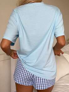 CovetEZ Bộ 2 món áo thun in hình vỏ sò và quần short kẻ caro dành cho nữ. - Màu xanh lam - Xem 8