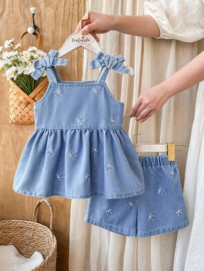 Vintaside Kids Young Girls ' Light Blue Washed Casual Loose Denim Camisole Top With Bow Decor, Paired With Loose Denim Shorts With All-Over White Bow Embroidery Design. Made Of Lightweight Soft Cotton Denim, A Must-Have For Fashionable Girls, Suitable For Spring/Summer Wear, Casual, Photoshoot, Party. 2026 Summer New Arrival