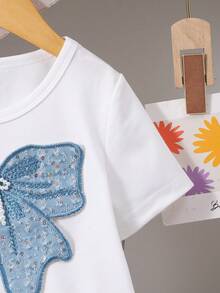 SHEIN 2件套 女童Y2K甜美可爱蝴蝶结圆领短袖露脐白色针织T恤+蓝色纹理迷你百褶裙套装 - 彩色 - 查看 4