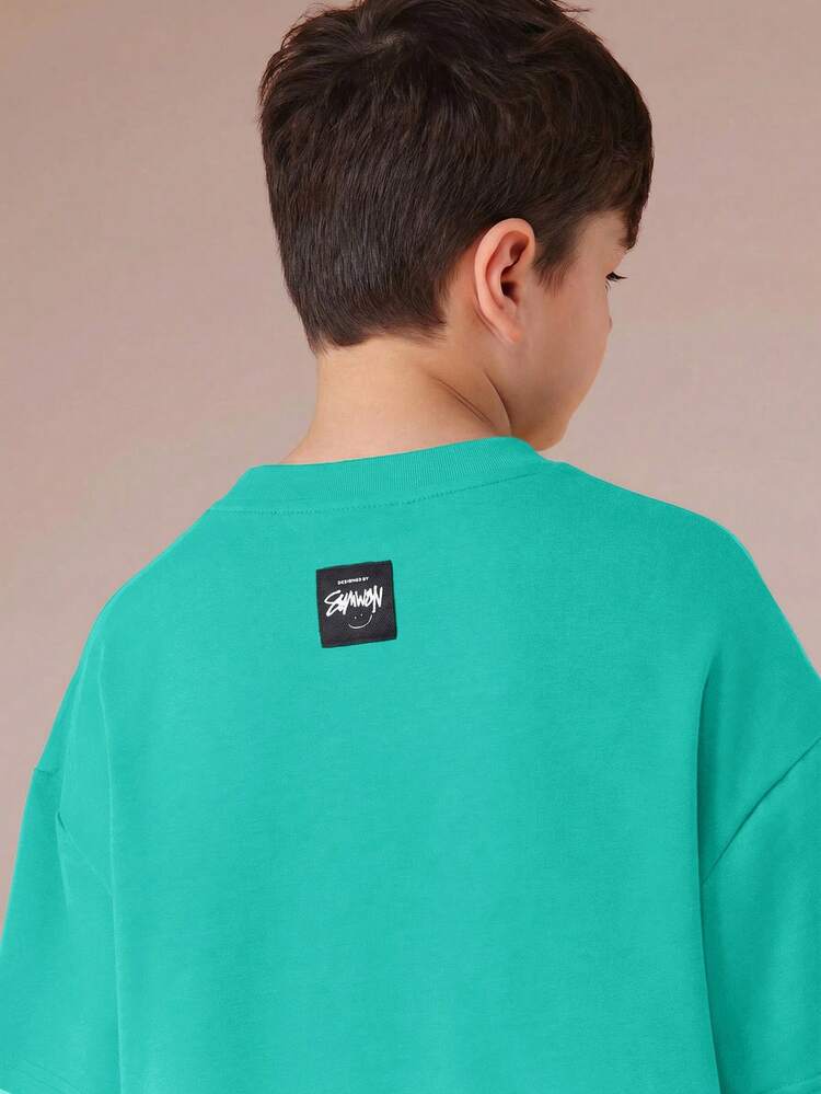 T-shirt col rond à manches courtes pour garçons avec design d'impression graffiti blanc, Top d'été décontracté