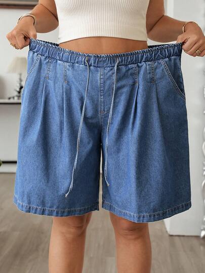 SHEIN CURVE+ Plus Size Women Tie Waist Pocket Pleated Loose Casual Denim Shorts Summer Carnival Costume Commuting Vacation Graduation Chic Y2k Cute Streetwear Coquette Party Wedding Elegant Business Casual Woman Business Beach Graduation Easter Plus Size Relaxed Fit Denim Shorts With Elastic Waist And Drawstring For Women Casual Summer Women's Plus Size Denim Bermuda Shorts With Comfortable Elastic Waist And Drawstring Mid-Thigh Length