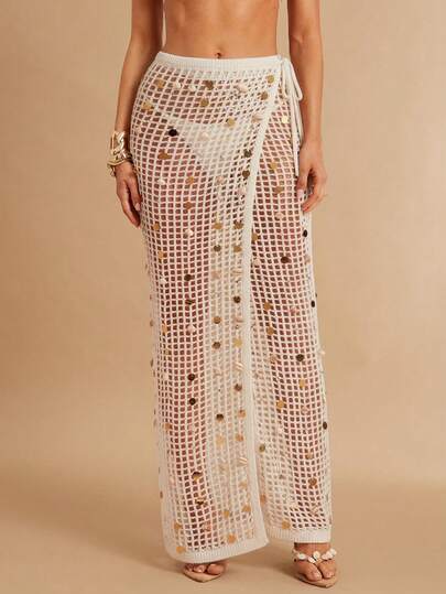 Silquee A Sexy Ivory Openwork Crocheted Maxi Skirt Perfect For Summer Beach Vacations, Featuring Shimmering Gold Sequin Embellishments And A Wrap-Style High Slit. This Elegant Beaded Cover-Up Is Ideal For Beach Trips, Pool Days, And Holiday Getaways. Ivory Sequin Crocheted Bikini Cover-Up Skirt. Beach Skirt, Women's Beach Outfit, Beach Vacation Outfit For Women, Summer Vacation Outfit, Sequin Skirt, Beach Dress For Women.