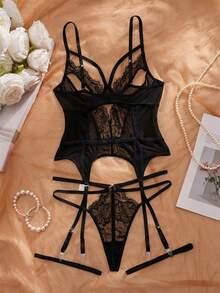 Crystal Vow Bộ đồ lót 4 món gợi cảm: áo hai dây khoét hở lưng, áo ngực không dây và quần lọt khe + 1 đôi dây nịt chân. - màu đen - Xem 2