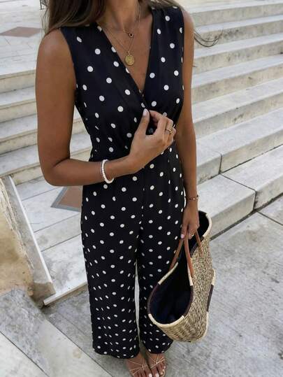 Pariaura Bộ jumpsuit không tay màu đen chấm bi trắng cổ điển, tinh nghịch - Cổ chữ V, xếp ly chéo, hở lưng, xẻ tà, ống rộng, phong cách xuân hè thanh lịch. Bộ jumpsuit không tay màu đen chấm bi trắng dáng ôm thanh lịch - Cổ chữ V, thiết kế chéo, hở lưng, ống rộng, phong cách xuân hè đa năng. Bộ jumpsuit không tay màu đen chấm bi trắng tinh tế, sành điệu - Cổ chữ V, xếp ly chéo, hở lưng, xẻ tà, ống rộng, phong cách xuân hè công sở.