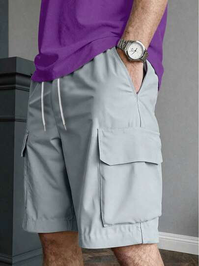 Manfinity Dauomo Pantalones cortos casuales de hombre con bolsillos cargo y cordón en la cintura