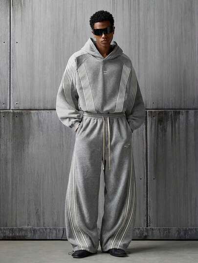 NEON BLANC Heren joggingbroek van gebreide stof met contrasterende bies en trekkoord in de taille.