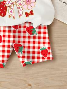 Souflis Souflis Bộ đồ bé gái mùa xuân/hè dễ thương, thời trang, họa tiết chú chuột lang nước nằm dài, hình dâu tây và nơ hồng, gồm áo thun tay ngắn cổ tròn dáng rộng và quần đùi, set đồ mùa hè cho bé gái, quần áo mùa hè cho bé gái. - Nhiều màu - Xem 5