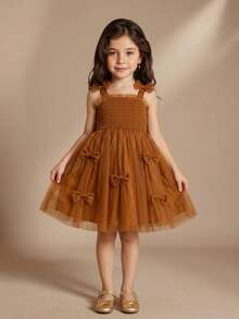 SHEIN 女童吊带连衣裙，饰有可爱的3D蝴蝶结，网纱薄纱咖啡色公主裙，可爱甜美优雅的夏季派对礼服 - 咖啡 - 查看 1