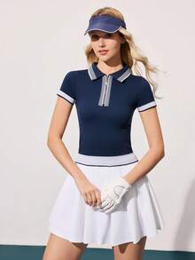 CourtClass Randig golfpikétröja med dragkedja och kort ärm för kvinnor - Marinblå - Visa 6