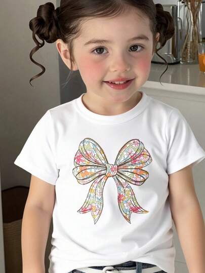 女婴花卉蝴蝶结印花圆领短袖T恤，甜美百搭舒适圆领上衣，花卉图案，适合度假、居家、日常穿着，四季皆宜。