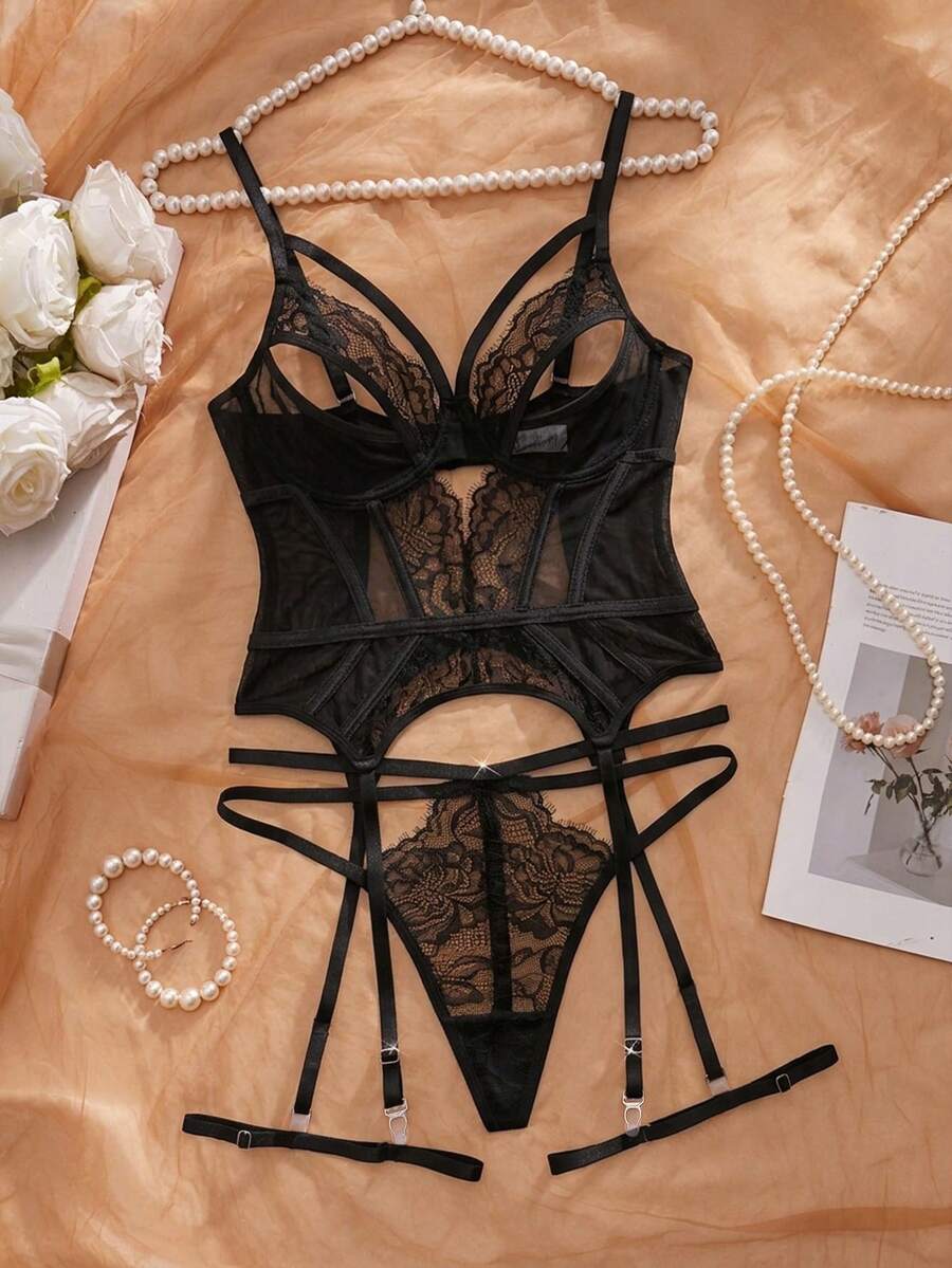 Crystal Vow Bộ đồ lót 4 món gợi cảm: áo hai dây khoét hở lưng, áo ngực không dây và quần lọt khe + 1 đôi dây nịt chân. - màu đen - Xem 1