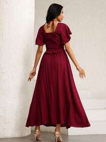 Modelyn Bộ đồ thể thao màu đỏ rượu vang kiểu dáng nghỉ dưỡng, áo tay ngắn cổ trái tim thắt eo kết hợp với chân váy xếp ly, thích hợp cho mùa xuân/hè. - Màu Đỏ Sâu - View 3