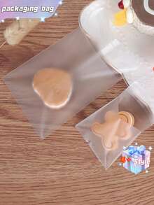 SHEIN 100 bolsas transparentes para galletas (10 cm, 10 cm, 6,8 cm) Suministros escolares Bolsas/cajas de alimentos adecuadas para caramelos, chocolate, galletas, etc. - transparente - Ver 3