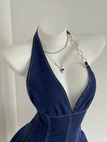 Elamini Vestido de mezclilla de verano con decoración de cadena de anillo redondo, escote halter sin espalda y volantes en el bajo, de moda sexy y urbana para mujer - Azul - Ver 5