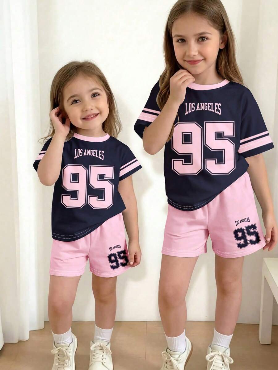 Bộ đồ 2 mảnh gồm áo thun và quần short phối màu tương phản xanh navy và hồng neon, kiểu dáng rộng rãi thoải mái, tay ngắn, cổ tròn, thích hợp cho bé gái mặc hàng ngày vào mùa xuân/hè, dạo phố, đi chơi, ở nhà, đi nghỉ mát, dự tiệc, đi học. - Nhiều màu - Xem 1