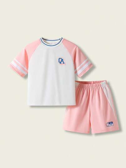 Casuvi Kids 2件套女童休闲简约字母数字印花撞色拼接圆领T恤和短裤套装，宽松版型，舒适透气，适合春、夏、秋季日常穿着，也适合生日派对、学校活动、家庭聚会、正式场合等场合。