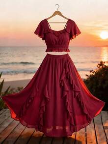 Modelyn Bộ đồ thể thao màu đỏ rượu vang kiểu dáng nghỉ dưỡng, áo tay ngắn cổ trái tim thắt eo kết hợp với chân váy xếp ly, thích hợp cho mùa xuân/hè. - Màu Đỏ Sâu - View 2