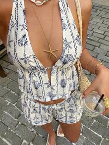 Sunnyshic Bộ đồ 2 mảnh họa tiết sao biển xanh và vỏ sò, thắt nút tre, cổ chữ V khoét sâu, hở lưng, gồm áo crop top và quần short cạp thấp, thích hợp cho nữ mùa xuân/hè, đi nghỉ mát, dự tiệc, phong cách retro, tối giản và đa năng. - màu đen - Xem 4