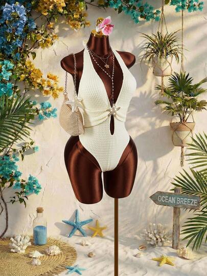 Amplova 1 bộ áo tắm liền thân gợi cảm dành cho nữ, kiểu dáng khoét eo hình giọt nước, buộc dây cổ và hở lưng, trang trí hoa vàng.