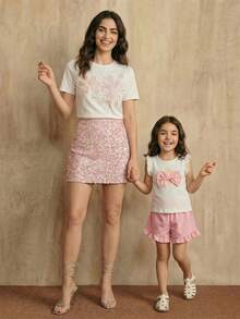 SHEIN 2件套女童针织提花白色荷叶边蝴蝶结花朵上衣和粉色荷叶边短裤套装，可爱夏季背心和短裤套装 - 白色 - 查看 7