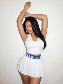 Slaydiva Bộ đồ mới mùa xuân sớm, lễ hội âm nhạc xuân hè, ngày lễ tình nhân, lễ Phục sinh, phong cách thường ngày đơn giản và cơ bản, phong cách đường phố Y2K ngọt ngào, bán chạy nhất, hẹn hò hàng ngày, phong cách cô gái nóng bỏng, gợi cảm, phong cách thể thao và sành điệu, cổ polo, cổ chữ V, không tay, áo ba lỗ chữ I, áo ba lỗ xếp ly bên hông + eo xanh, gân, eo chun, chân váy xếp ly, chân váy ngắn, bộ đồ trắng, bộ hai mảnh dành cho nữ -A - trắng - Xem 4