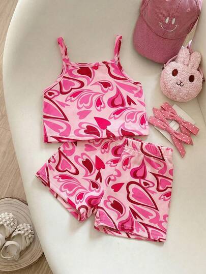 SHEIN 2pcs/Set Young GirlHeart Print Camisole Top And Shorts Set Young Girl/Babygirl 2pcs Set, Fashionable Heart Knitted Girl Two Piece Summer Sets Girl Matching Set Short Kids Two Piece Vacation Set Summer Matching Set Heart Print Sleeveless Set Girls Pink Heart Print Cami With Elastic Waist Shorts Set Summer Tops Summer Clothes