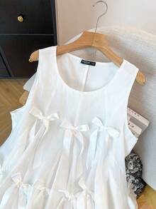 GlowEve CURVE Một chiếc áo vest lưới thắt nơ trẻ trung, tạo nên bầu không khí năng động, kết hợp với áo không tay xếp nếp. - trắng - Xem 8