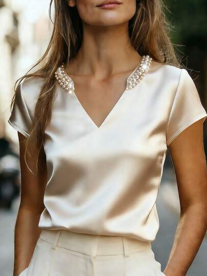 Ellegaria. Champagne-Colored Satin V-Neck Satin Pearl-Embellished Fitted Short-Sleeved T-Shirt For Women, Elegant And Sophisticated. Also Suitable For White, Sequined, Office Wear, Social Occasions, Holidays, Weddings, Parties, Festivals, Summer, And Apricot.Graduation Season Attire, Fashionable Casual Commuter Wear, Business Office Wear, Versatile And Stylish Everyday Casual Wear, Urban Teacher's Professional Attire