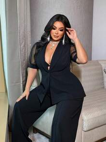 NU&NOW Conjunto plus size preto com blazer ajustado e calça pantalona, ideal para o trabalho ou deslocamento diário. - Preto - Ver 1
