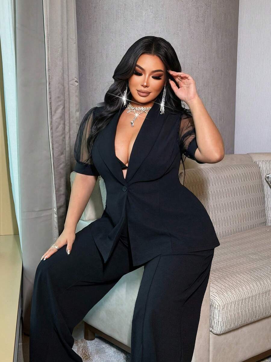 NU&NOW Conjunto plus size preto com blazer ajustado e calça pantalona, ideal para o trabalho ou deslocamento diário. - Preto - Ver 1