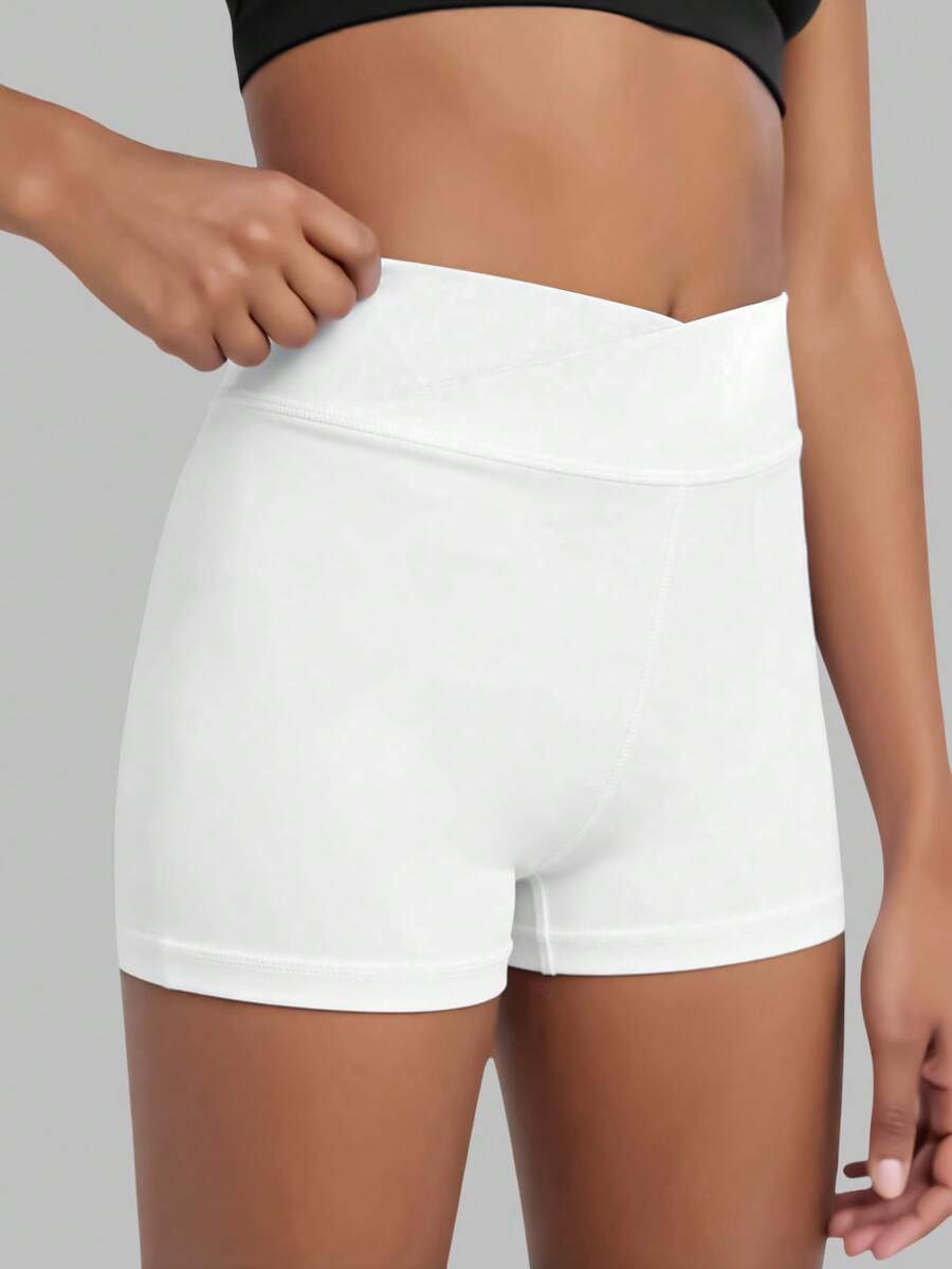 SHEIN Quần short thể thao cho bé gái tuổi teen, màu trơn, kiểu dáng tối giản, cạp chéo, chất liệu co giãn 4 chiều, phù hợp cho đạp xe, chạy bộ và tập luyện. - trắng - Xem 1