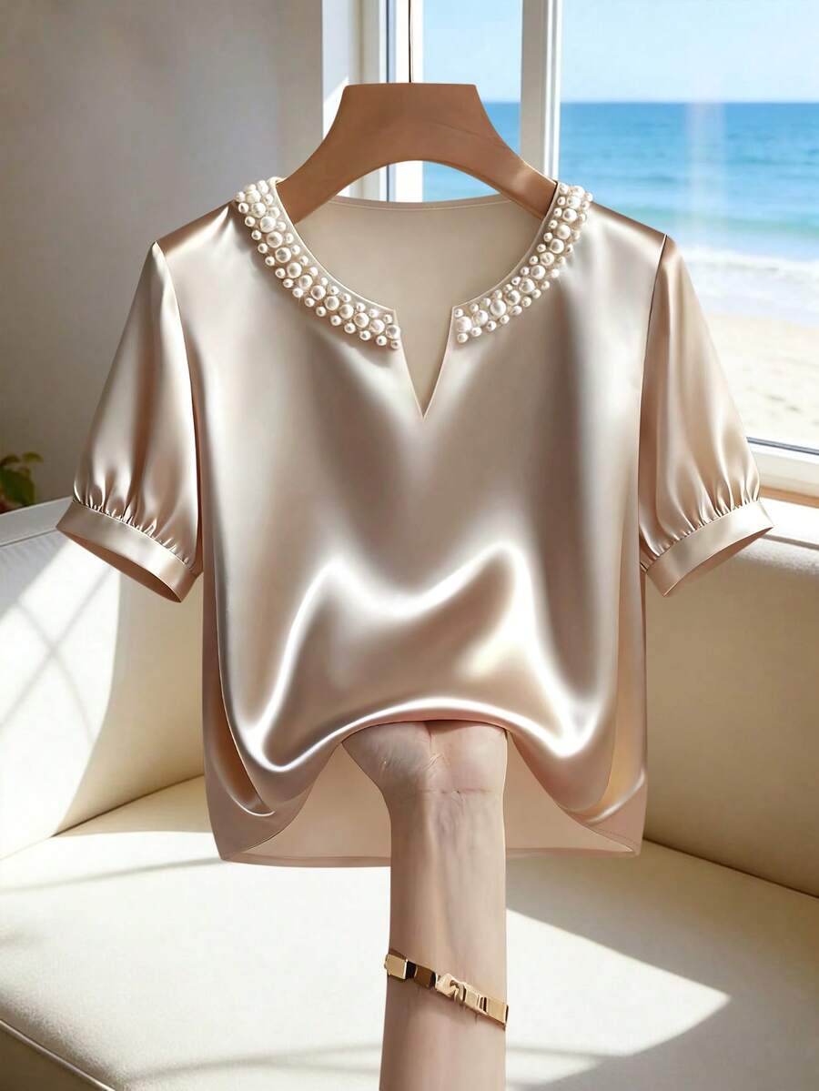 Franclia Blusa casual de satén de acetato holgada con cuello en V y adornos de perlas, blusa de perlas, blusas de satén para mujer, blusa de satén, blusa de seda, blusa dorada para mujer, blusas elegantes para mujer, elegante para fiesta, blusa de perlas para mujer, blusa para mujer, elegante y clásica, tops y blusas para mujer, tops de manga corta para mujer, tops de seda para mujer, últimos tops para mujer, nuevos lanzamientos, nueva blusa - Albaricoque - Ver 1