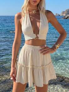 Nevyona 女士金属装饰露背系带性感露脐上衣搭配荷叶边A字蛋糕裙，度假性感套装，情人节/派对/单身节套装 - 杏色 - 查看 4