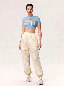 Activina Camiseta deportiva de manga corta casual con contraste de color para mujer - Celeste - Ver 7