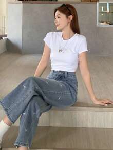 Quần jeans nữ dáng casual thêu hình bướm, đã qua xử lý giặt. - Màu xanh lam - Xem 7